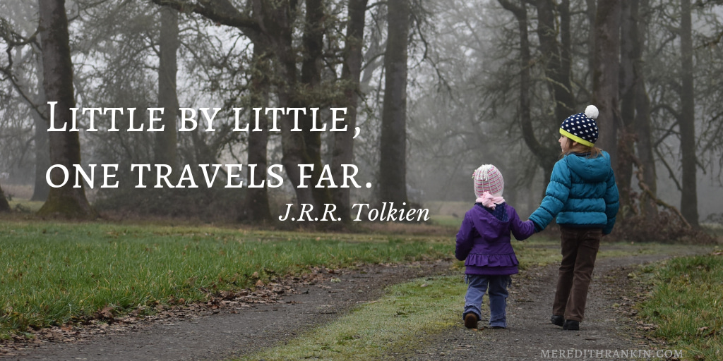 Two children holding hands walking through woods. Shows quote from J. R. R. Tolkien: Little by little, one travels far.