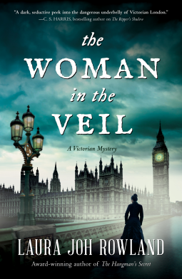 Book cover of The Woman in the Veil by Laura Joh Rowland shows title, author, and subtitle reading "A Victorian Mystery". Background shows silhouette of woman in Victorian clothing in front of Big Ben on a foggy morning.